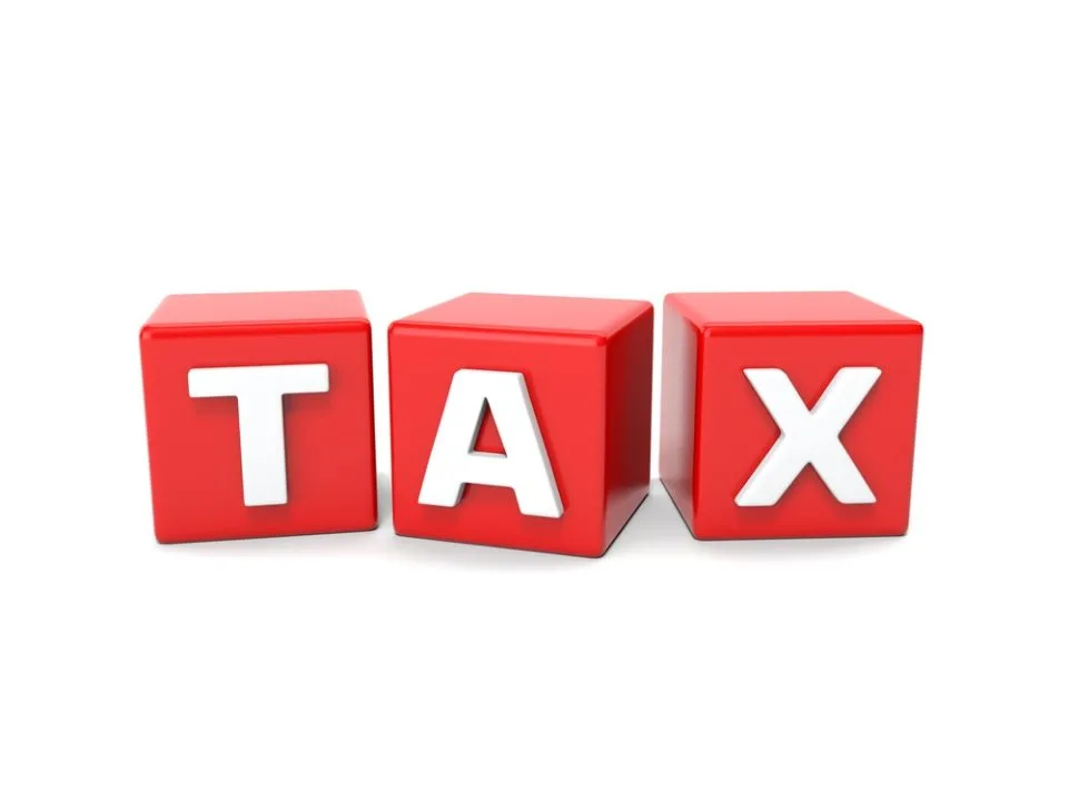 The Word TAX in Red Boxes
